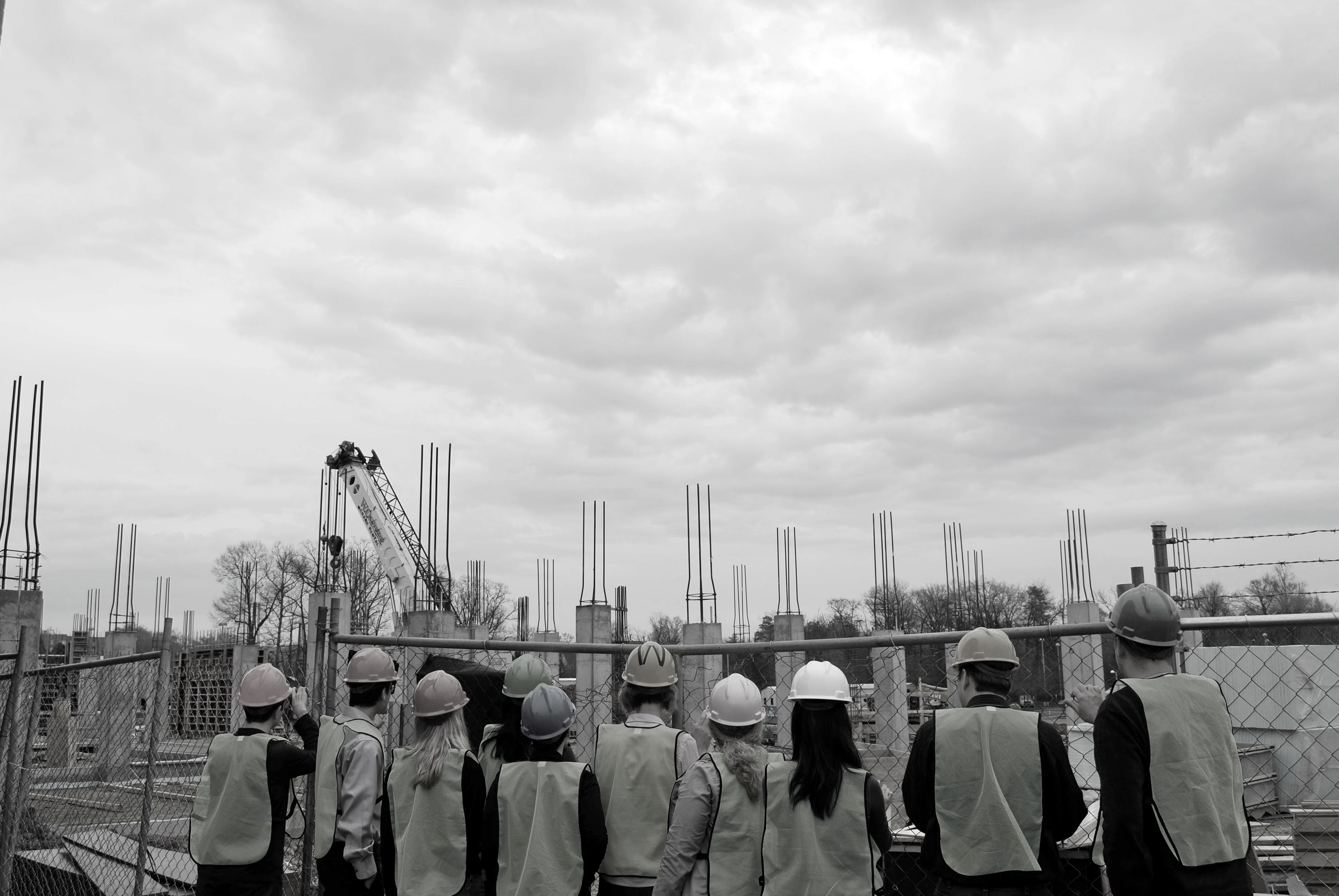 NFATC employees looking at construction