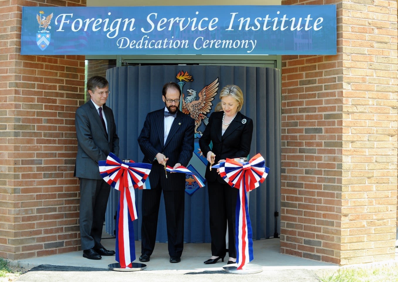Secretary of State Hillary Rodham Clinton holds a Ribbon Cutting Ceremony for the newly expanded George P. Shultz Center.